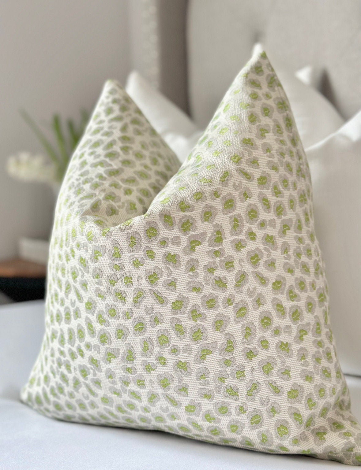 Lime Green Silky Leopard Throw Pillow Cover featuring bold leopard print on luxurious silky fabric. This vibrant, made-to-order designer pillow is perfect for modern and eclectic interiors, adding a pop of color and texture to living rooms or bedrooms.