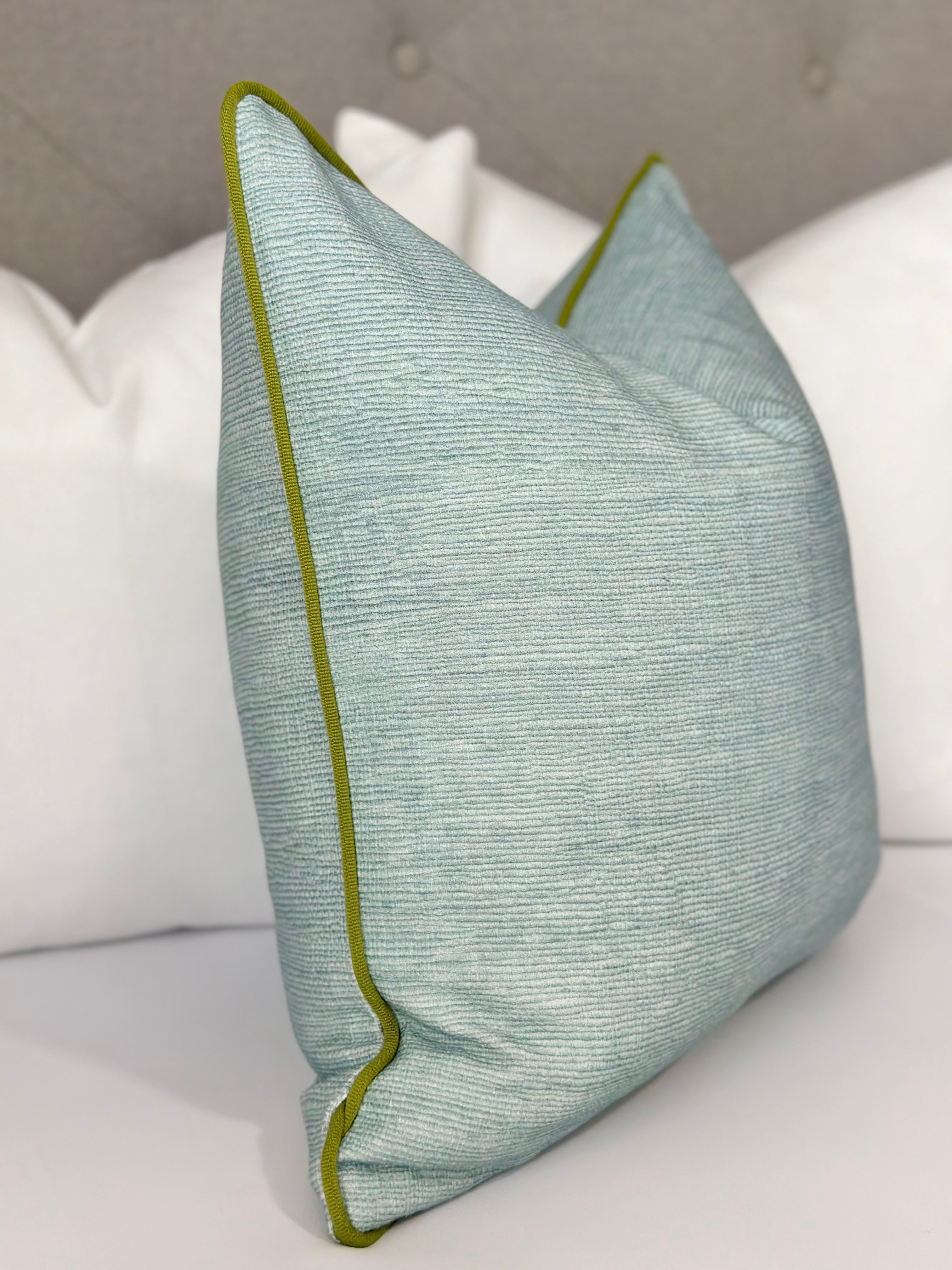 Seaglass pillow cover with green trim detail, perfect for coastal and modern decor, adding a refreshing touch to living rooms, bedrooms, and home interiors. Custom Seaglass Pillow Cover with Green Trim – Luxury Coastal and Modern Decor Accent Pillow.