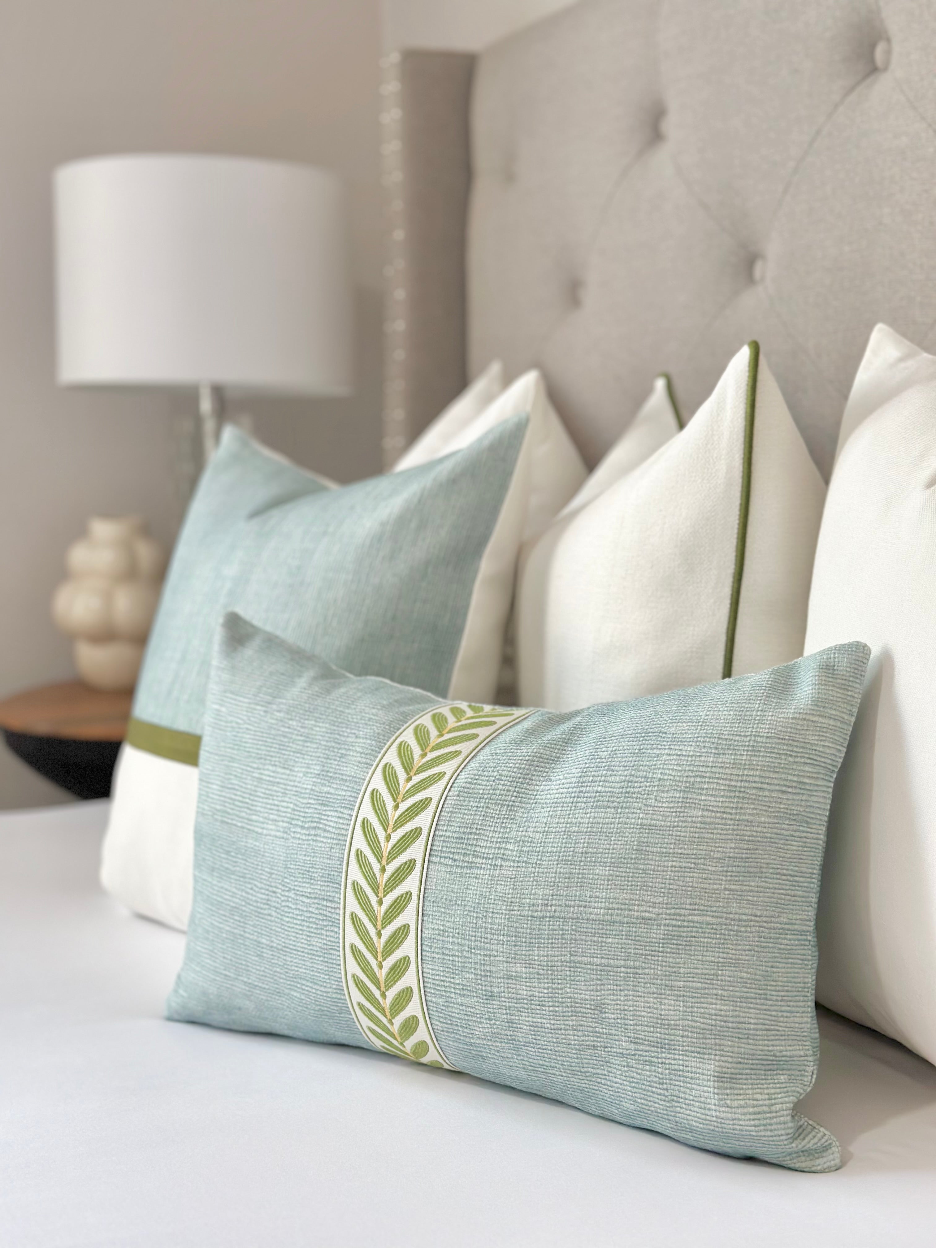 Custom Seaglass Throw Pillow Cover with Luxurious Decorative Tape – Designer Pillow for Modern Coastal Decor. Made-to-Order, High-Quality Seaglass Fabric with Sophisticated Decorative Tape Accent. Luxury Decorative Throw Pillow for Living Room, Bedroom, or Coastal Home Interiors. Handcrafted, Stylish, and Elegant Piece to Elevate Your Home.