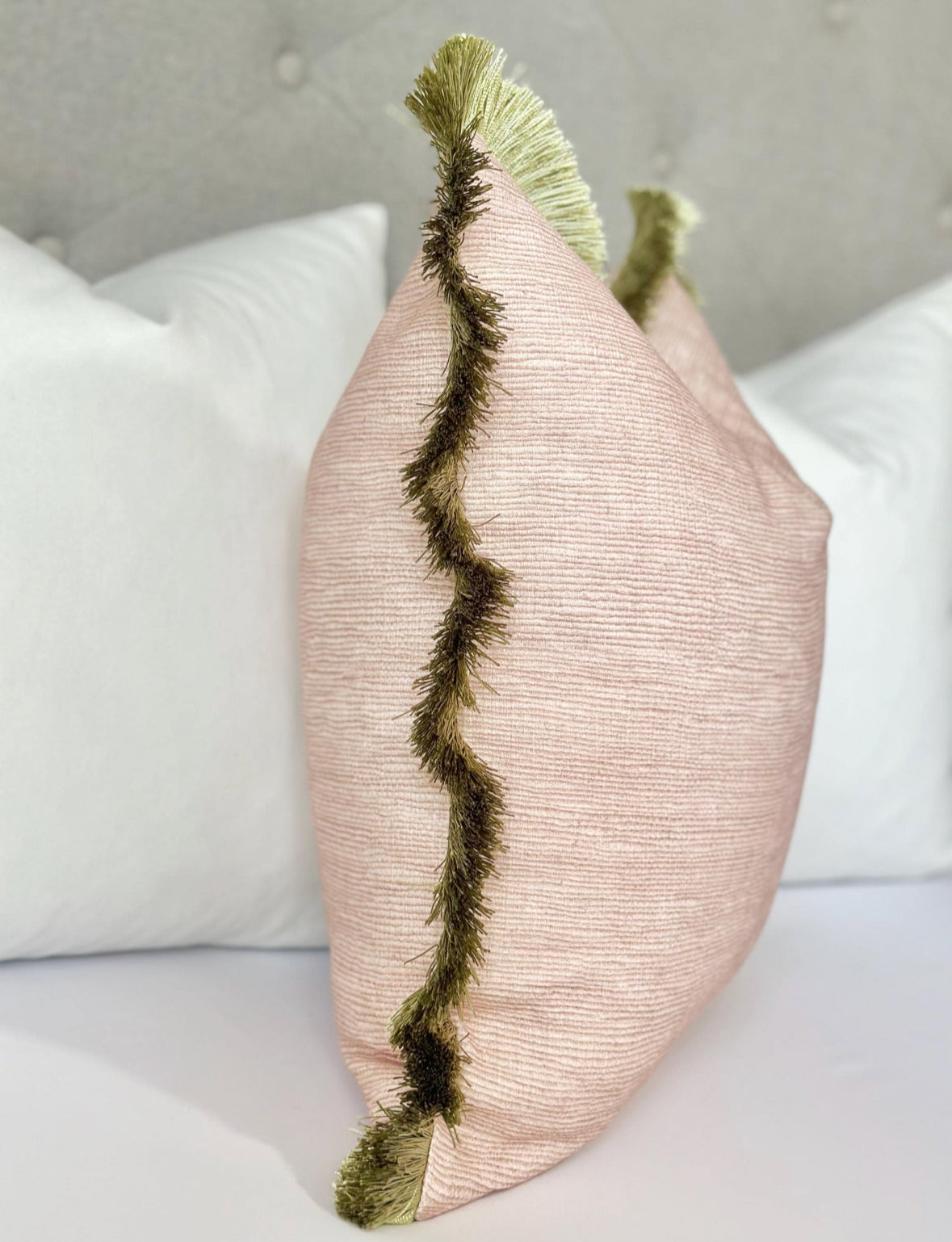 Throw Pillow with vibrant green brushed fringe, crafted from high-quality textured blush fabric. This designer pillow cover offers a luxurious blend of color and texture, perfect for modern and contemporary decor styles.