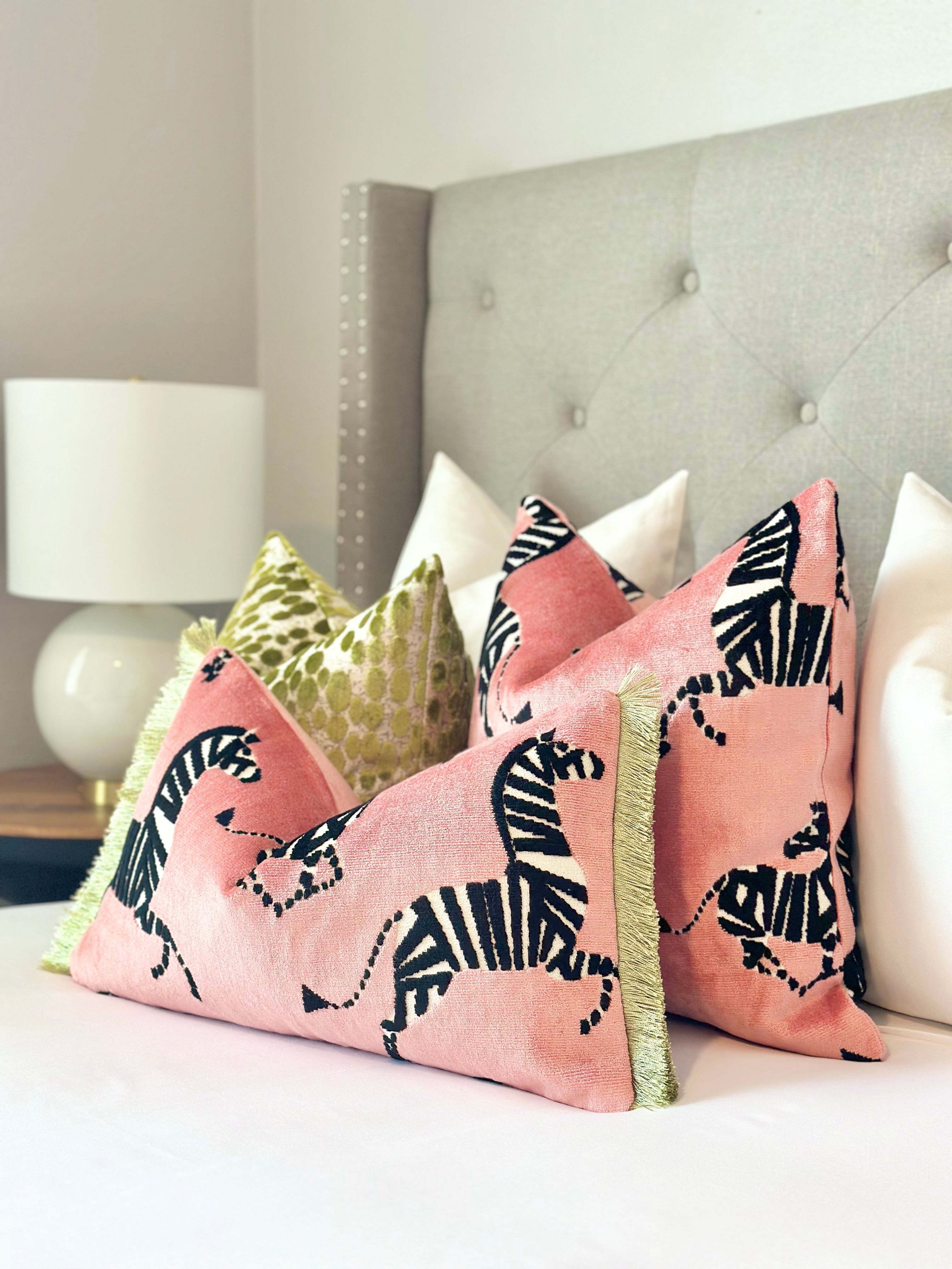 Luxurious pink velvet throw pillow cover with bold zebra print, perfect for adding a touch of modern elegance to your home decor. Custom green velvet zebra throw Pillow Cover with olive green brushed fringe – Luxury Designer Pillow for Modern and Chic Home Decor.
