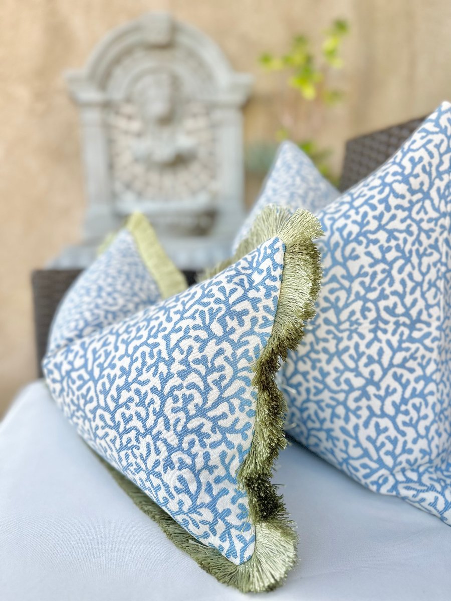 blue coral pillow, outdoor pillow with fringe, olive green fringe accent, marine-inspired decor, coastal vibe pillow, custom-made patio cushion, poolside decor accessory, durable outdoor pillow, elegant patio accent, stylish coastal outdoor pillow