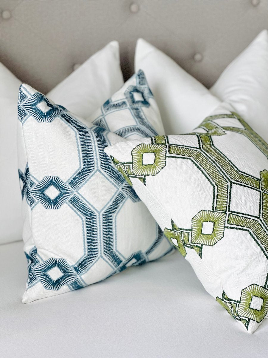 Custom throw pillow cover with intricate blue embroidery, made from high-quality designer fabric to add a touch of elegance and detail to your home decor. Ideal for sofas, living rooms, or bedrooms, this luxurious, made-to-order pillow cover elevates your space.