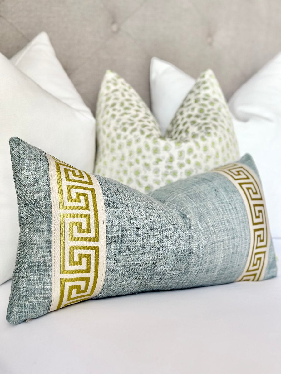 Modern mist blue lumbar throw pillow cover featuring a bold lime green Greek key detail, designed to elevate coastal and modern interiors with a refreshing blend of serenity and vibrant sophistication.