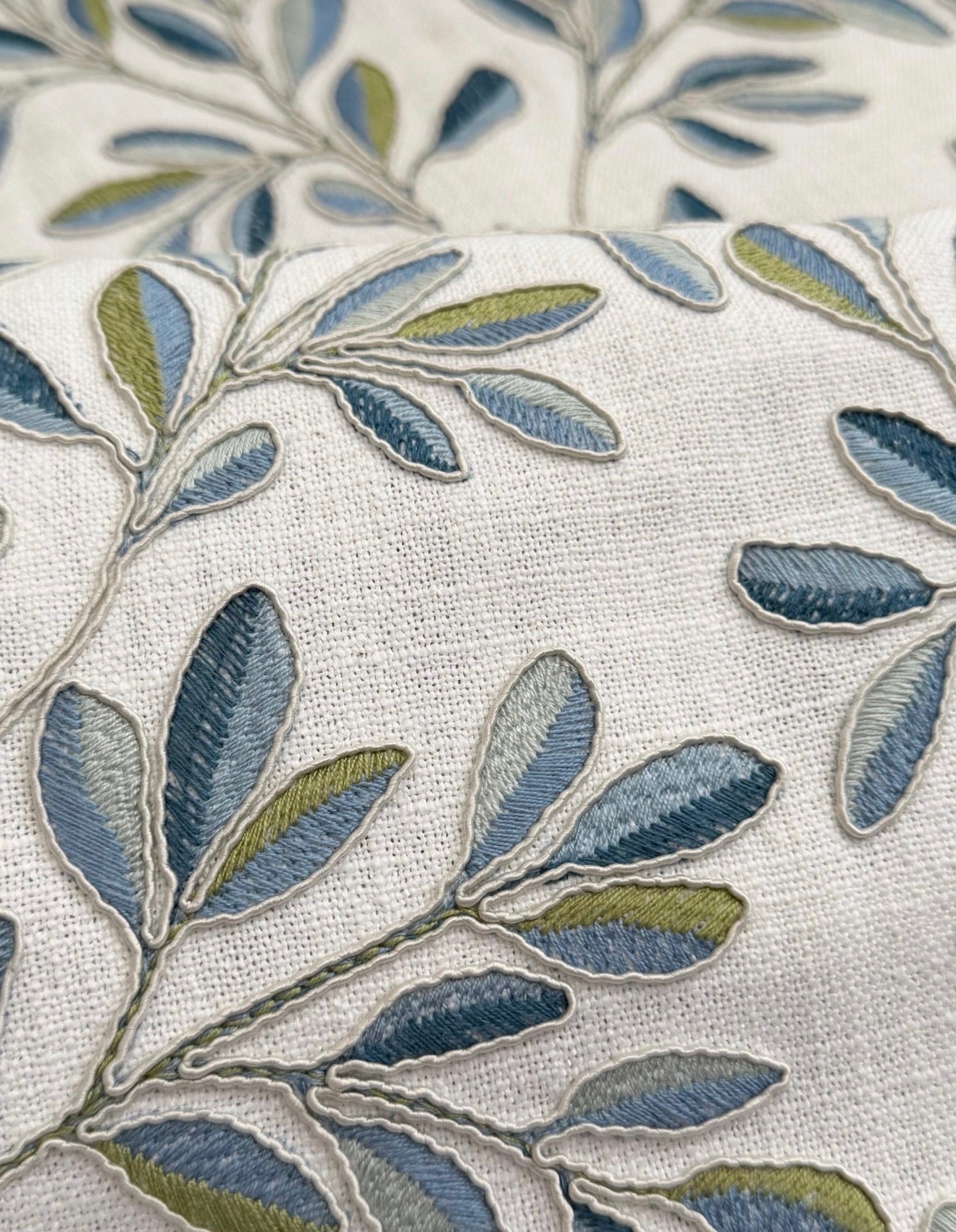 Blue and Green Floral Embroidery fabric swatch