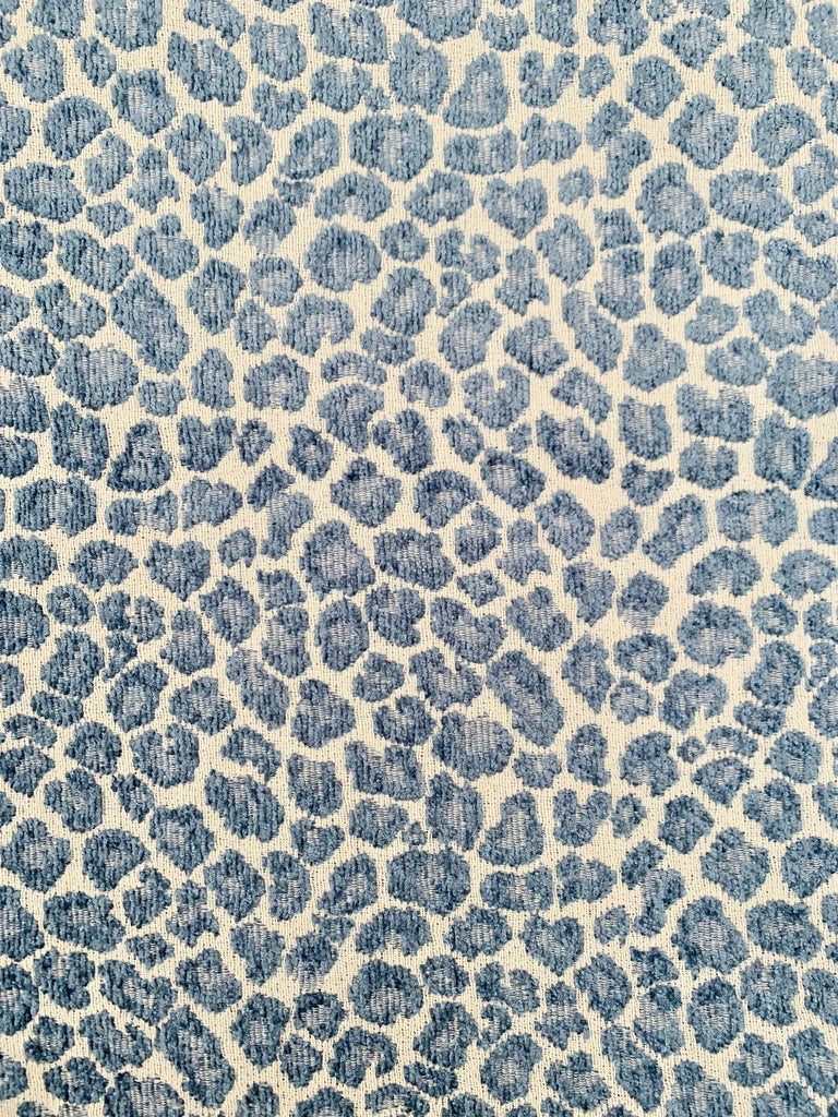 Blue cheetah pillow cover with brushed fringe detail
